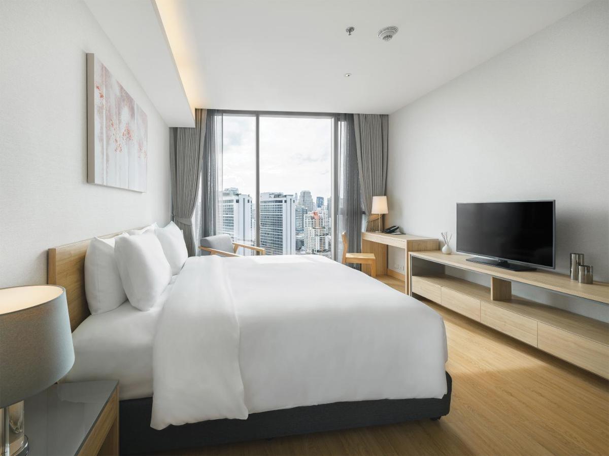Oakwood Suites Bangkok Dış mekan fotoğraf Deluxe Room