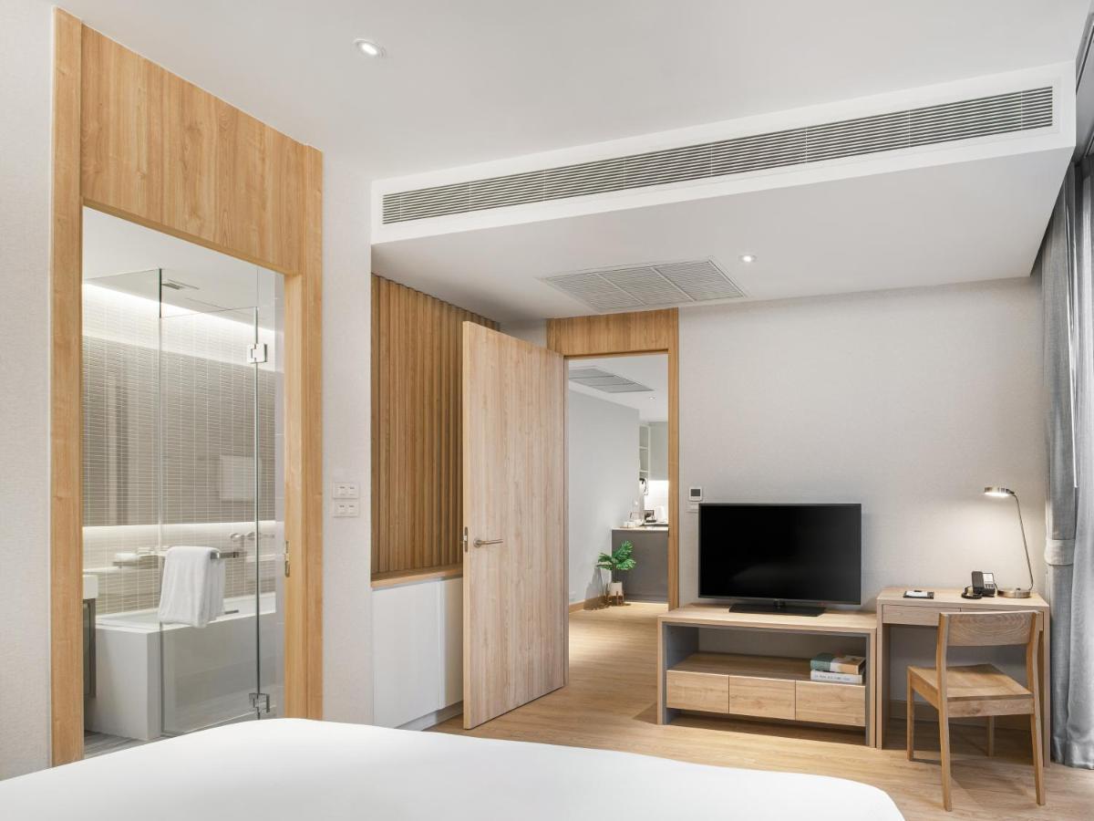 Oakwood Suites Bangkok Dış mekan fotoğraf Deluxe Room