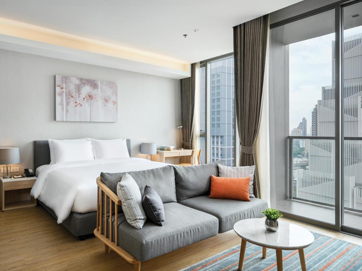 Oakwood Suites Bangkok Dış mekan fotoğraf Deluxe Room