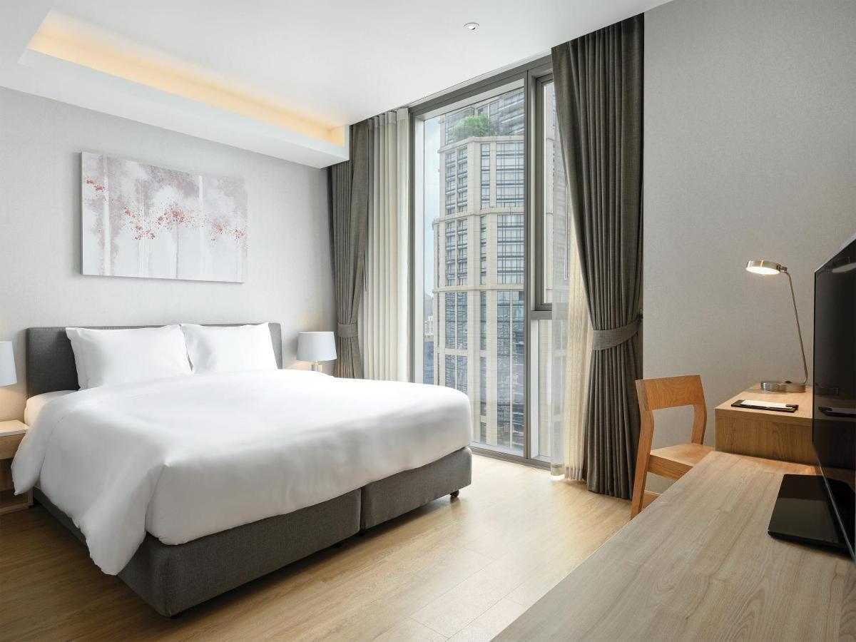 Oakwood Suites Bangkok Dış mekan fotoğraf Deluxe Room