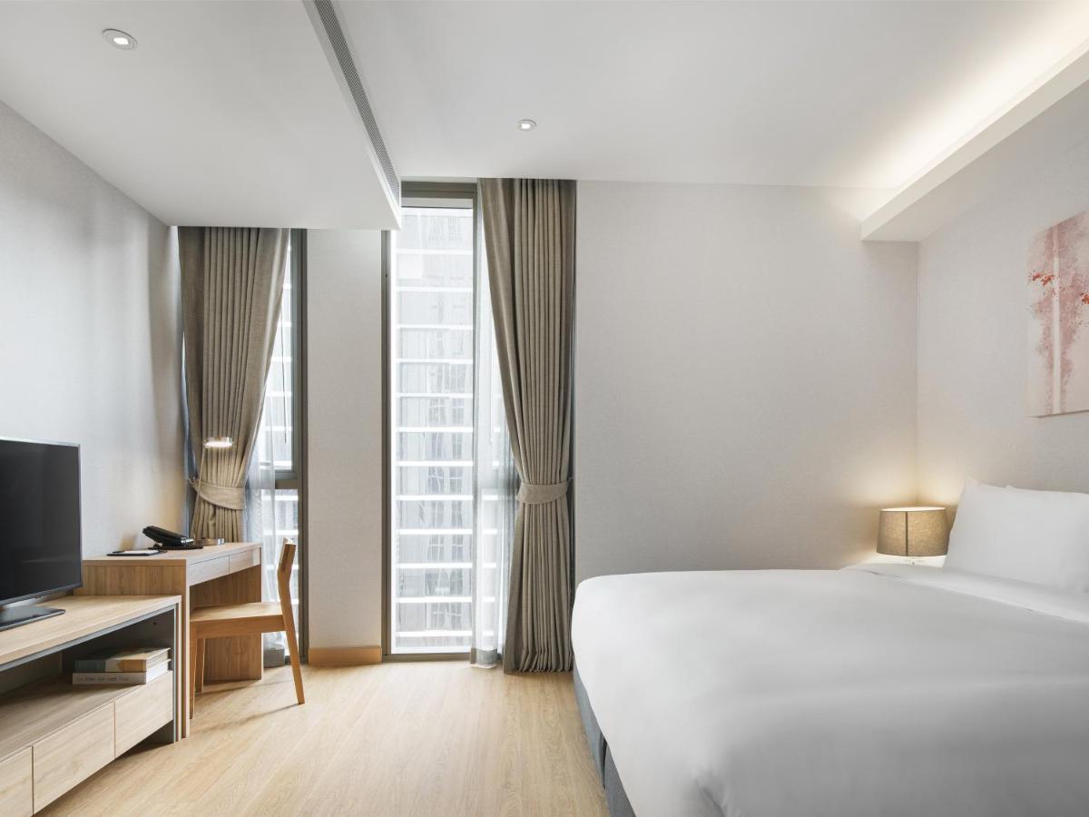 Oakwood Suites Bangkok Dış mekan fotoğraf Deluxe Room