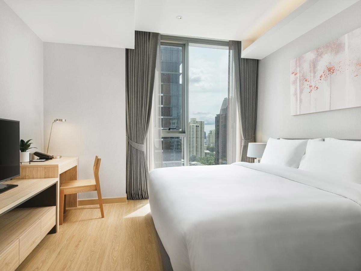 Oakwood Suites Bangkok Dış mekan fotoğraf Deluxe Room