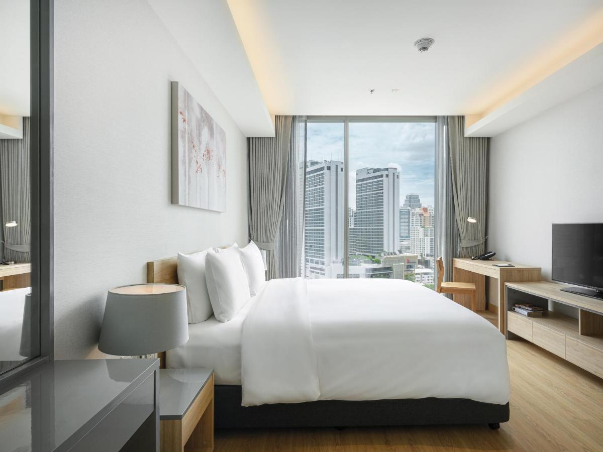 Oakwood Suites Bangkok Dış mekan fotoğraf Bedroom