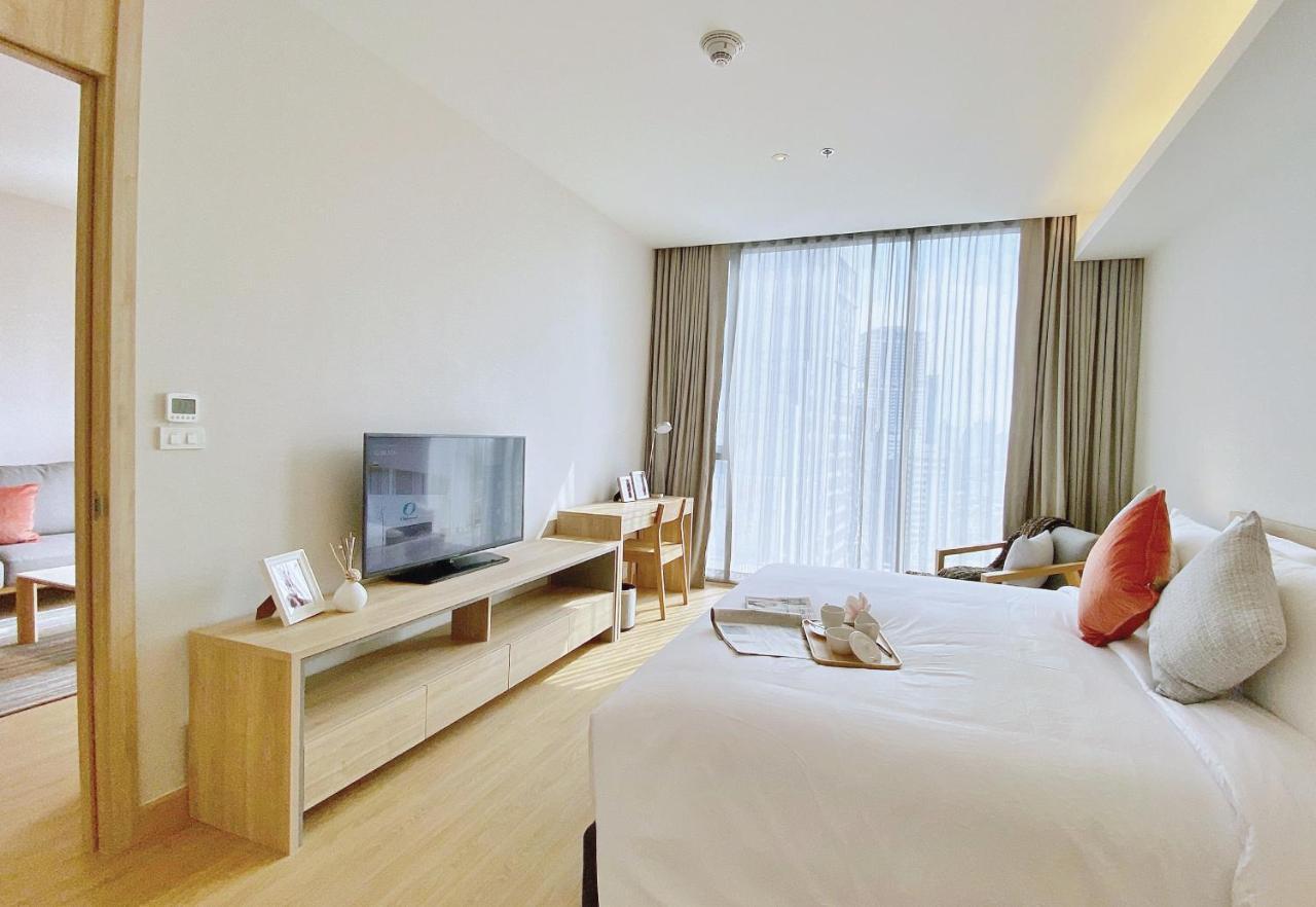 Oakwood Suites Bangkok Dış mekan fotoğraf Deluxe Room