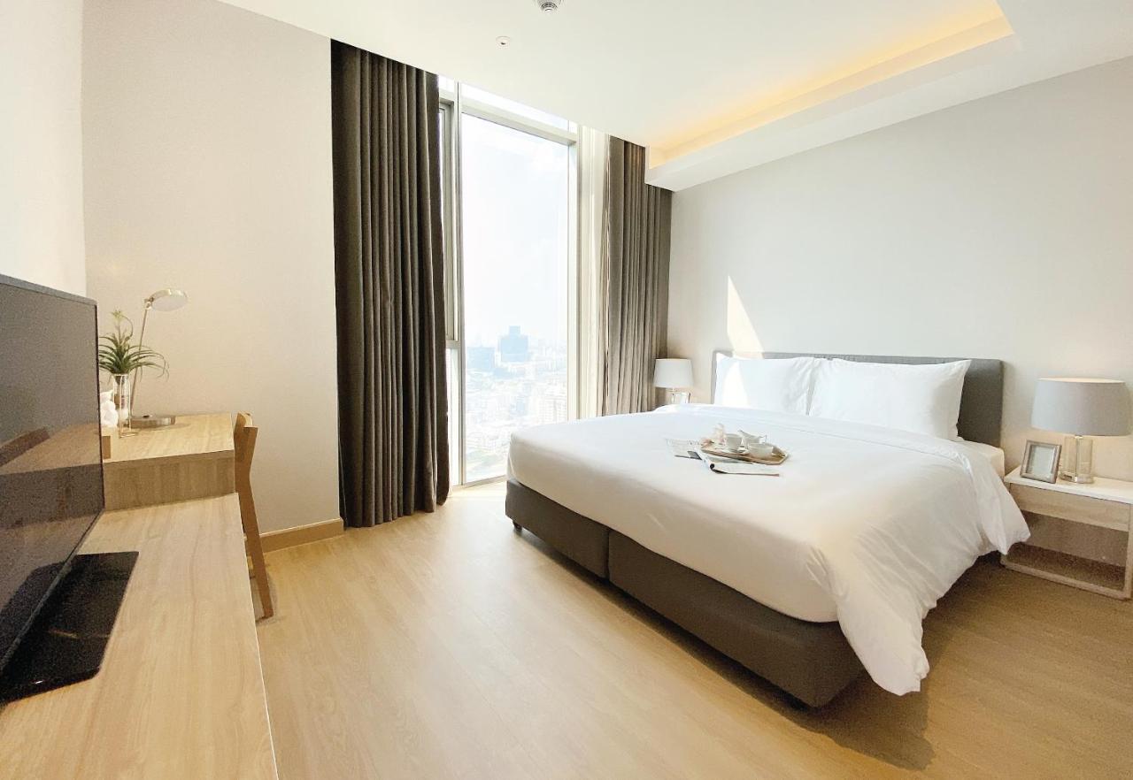 Oakwood Suites Bangkok Dış mekan fotoğraf Deluxe Room
