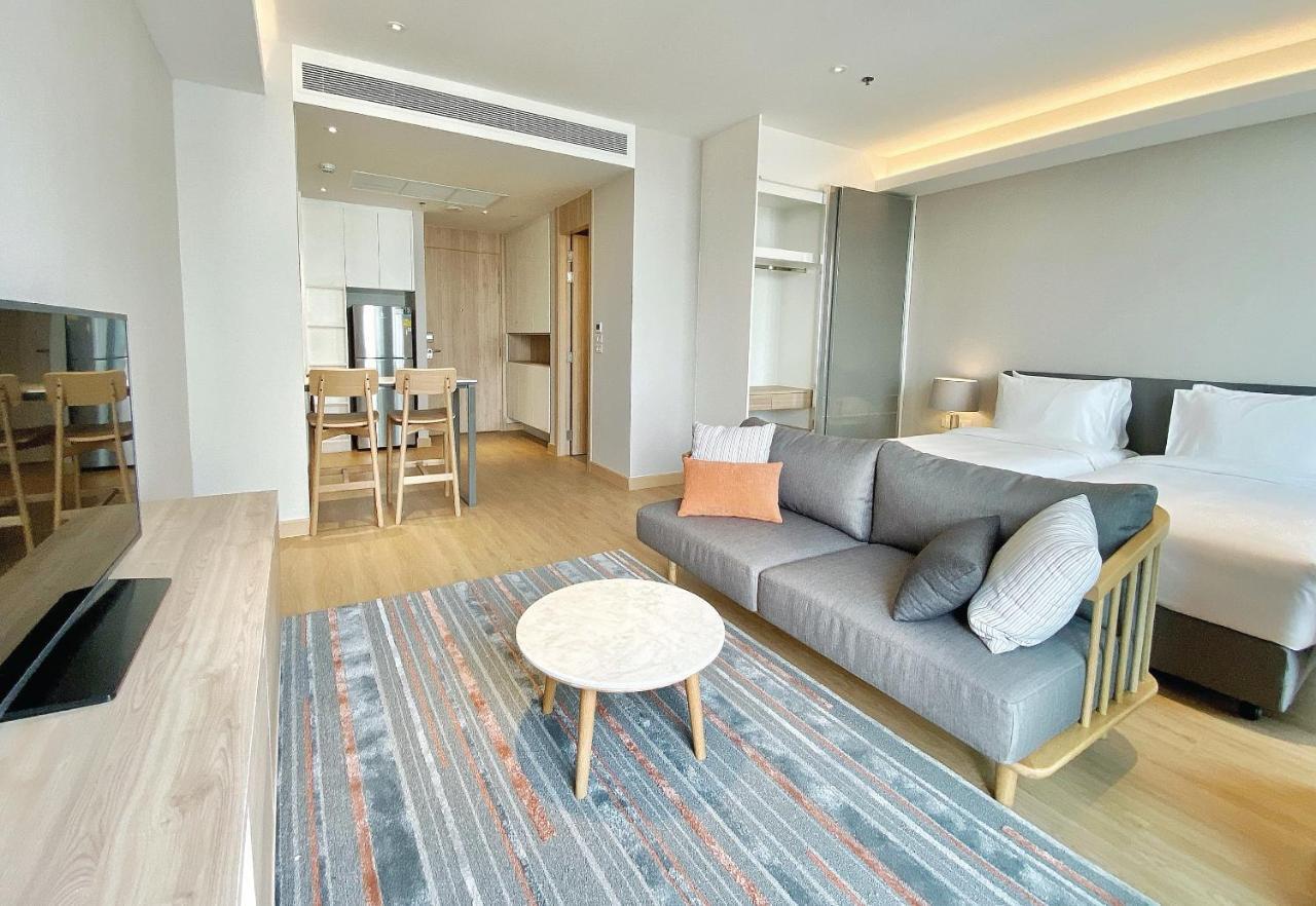 Oakwood Suites Bangkok Dış mekan fotoğraf A typical one-bedroom apartment