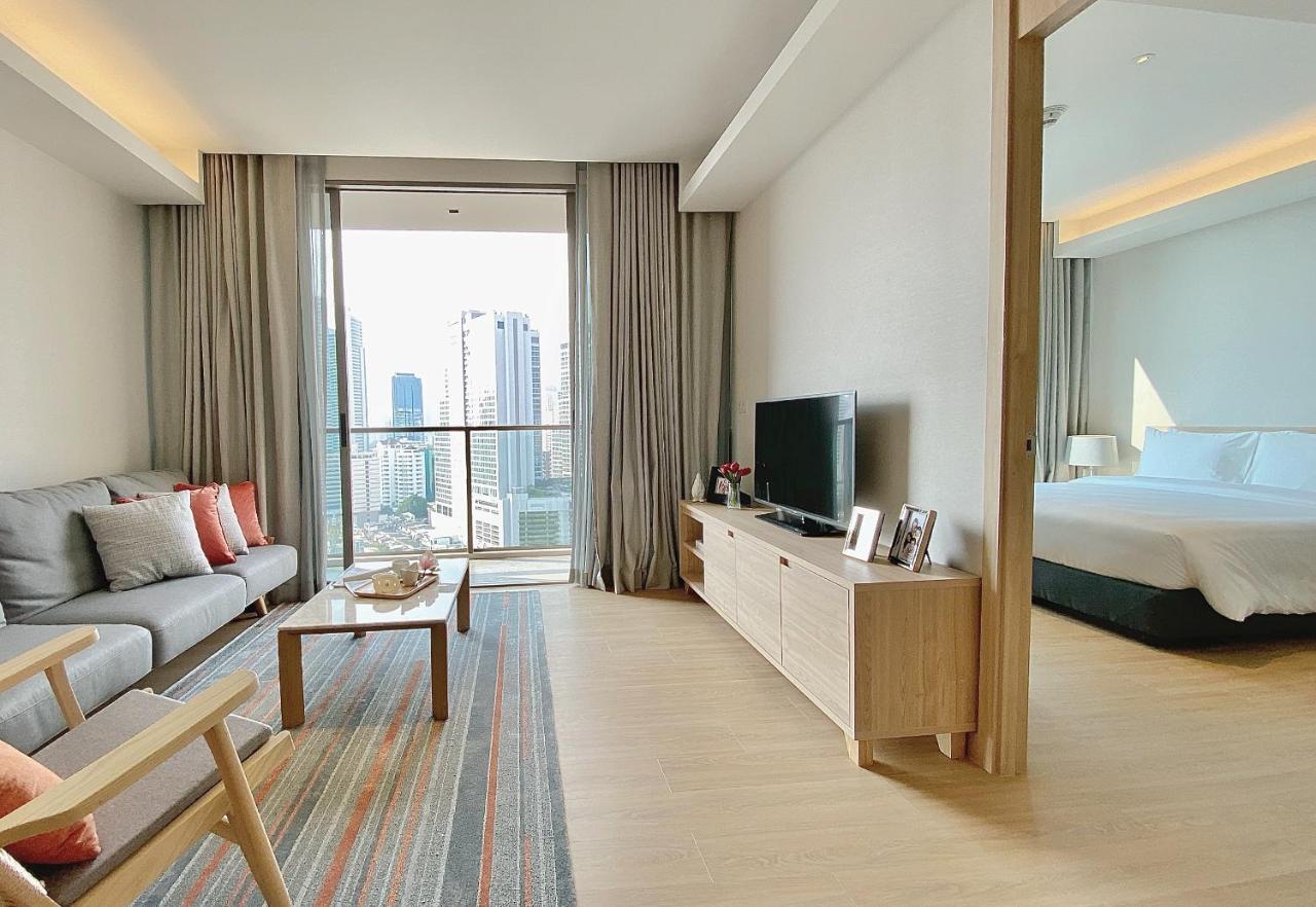 Oakwood Suites Bangkok Dış mekan fotoğraf A typical one-bedroom apartment